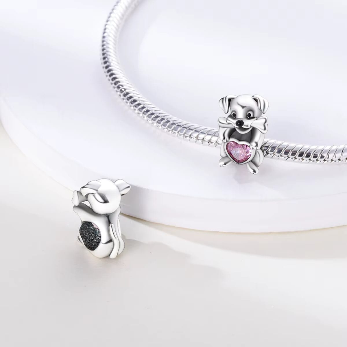 Amarante Jewelry Dog Holding Pink Heart Charm