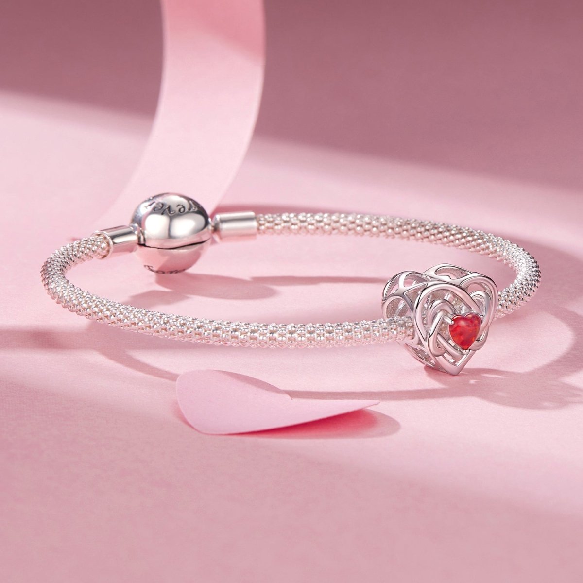 Amarante Jewelry Fiery Opal Love Knot Charm