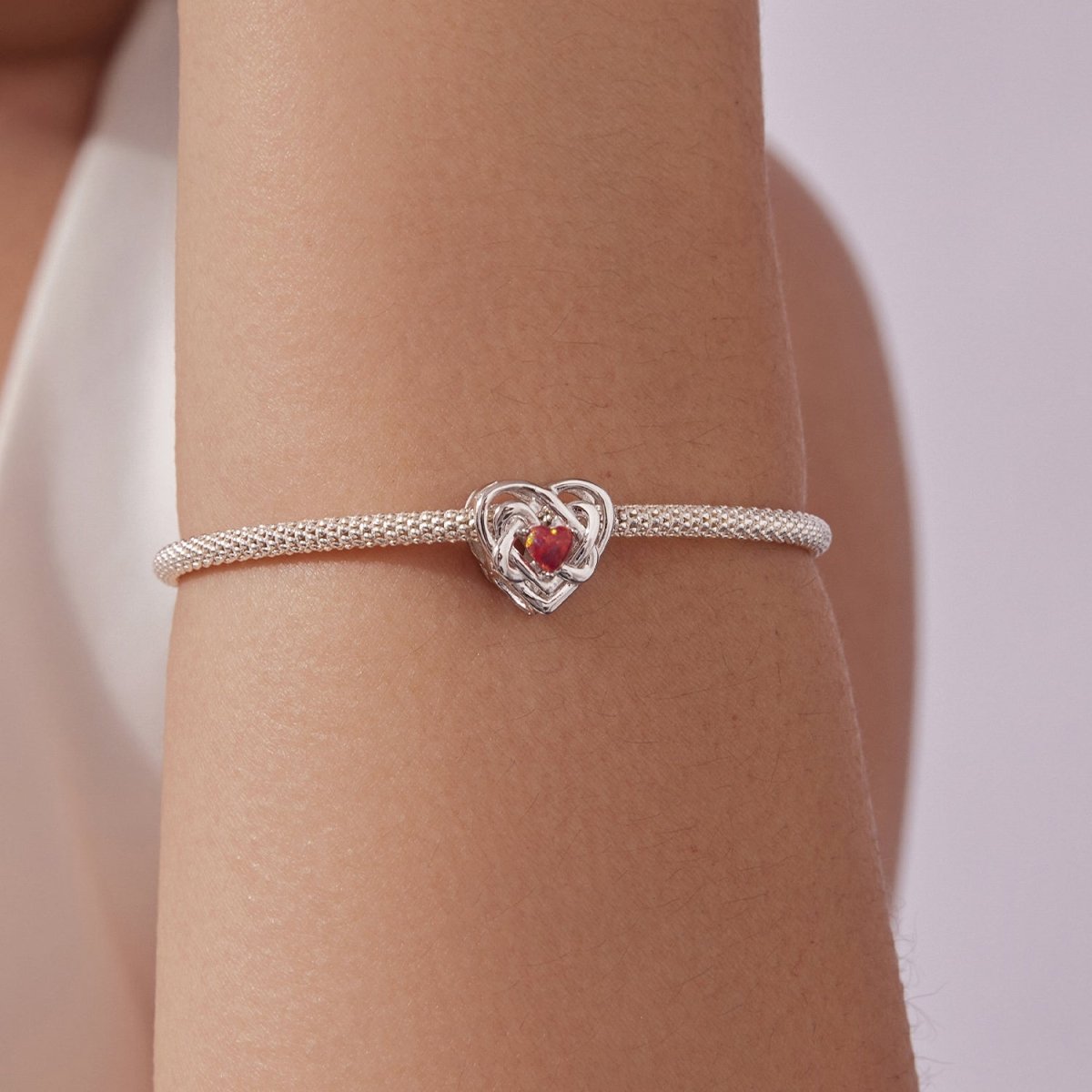 Amarante Jewelry Fiery Opal Love Knot Charm