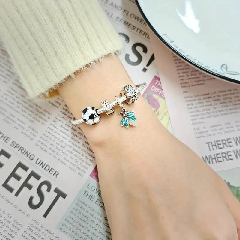 Amarante Jewelry FootBall Bead With Blue Heart Accents