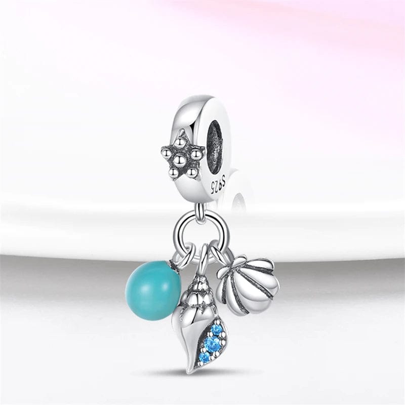 Amarante Jewelry Glow in the Dark Orb Conch Shell and Clam Dangle Charm
