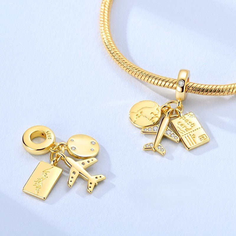 Amarante Jewelry Golden Globe, Airplane & Postcard Triple Dangle Charm