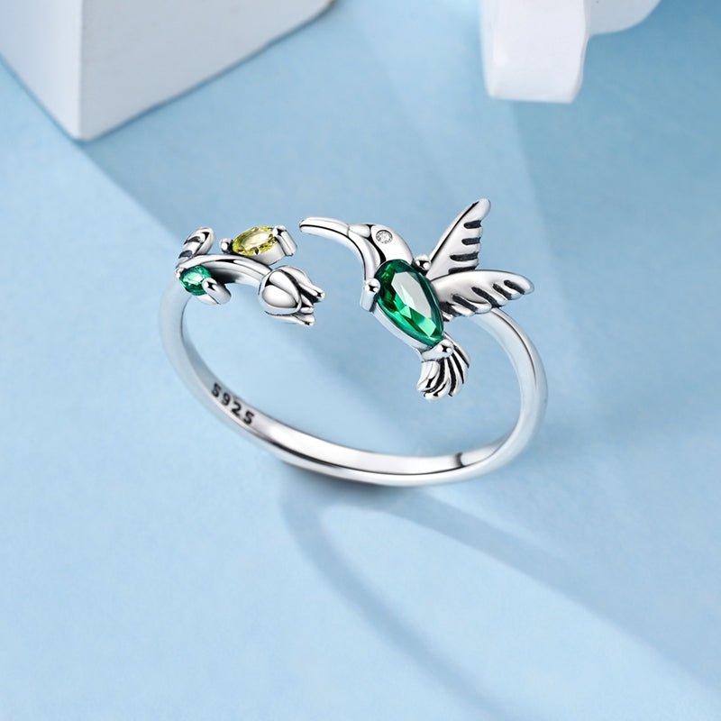 Amarante Jewelry Hummingbird with Green Crystal & Floral Adjustable Ring