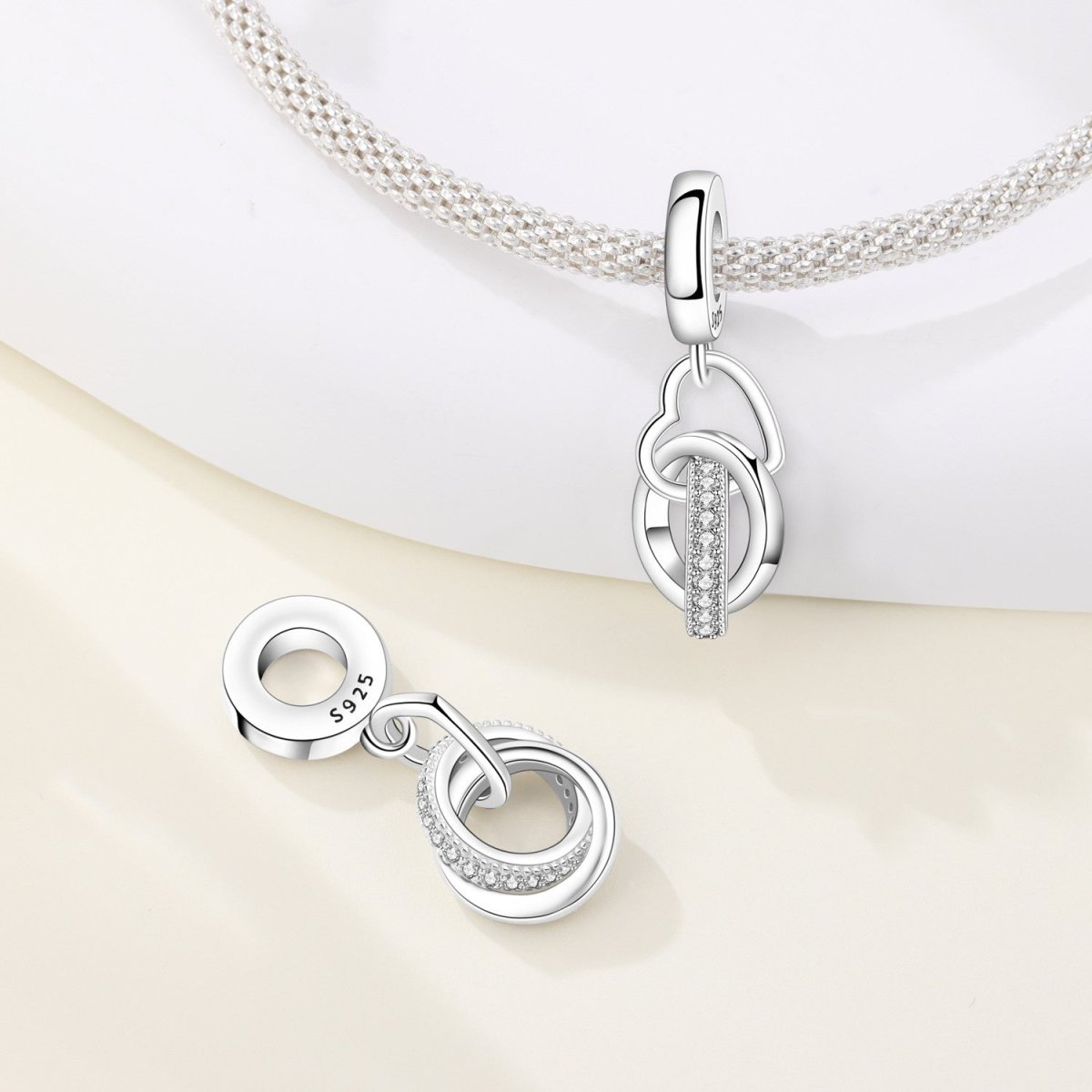 Amarante Jewelry Interlocking Rings & Heart Dangle Charm