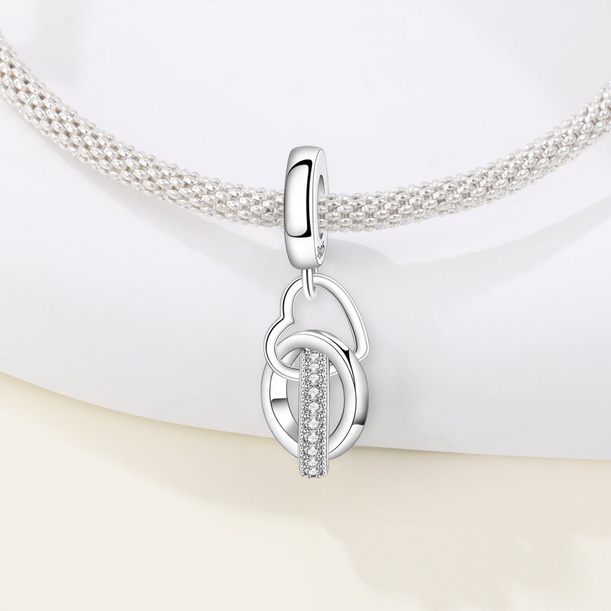Amarante Jewelry Interlocking Rings & Heart Dangle Charm