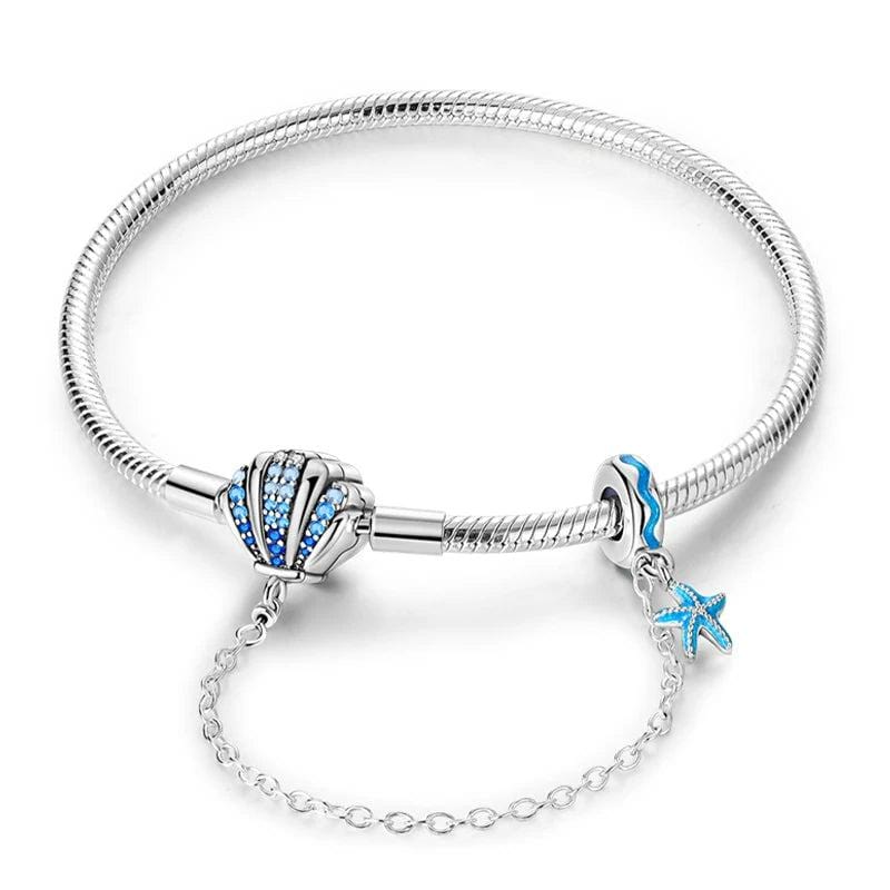 Amarante Jewelry Ocean - Themed Bracelet with Blue Crystal Seashell and Starfish Charms