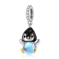 Amarante Jewelry Penguin with a Glowing Blue Sphere Dangle Charm