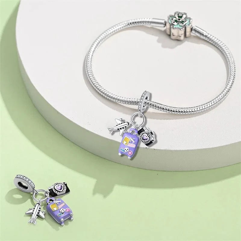 Amarante Jewelry Plane, Camera and Purple Suitcase Triple Dangle Charm