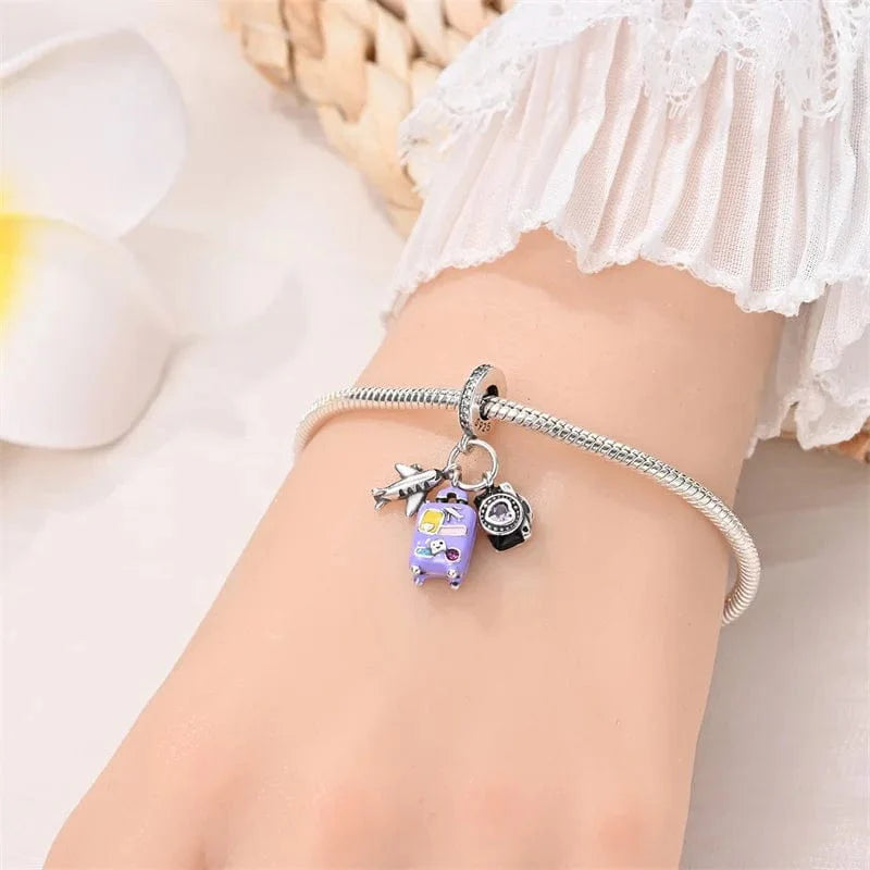 Amarante Jewelry Plane, Camera and Purple Suitcase Triple Dangle Charm