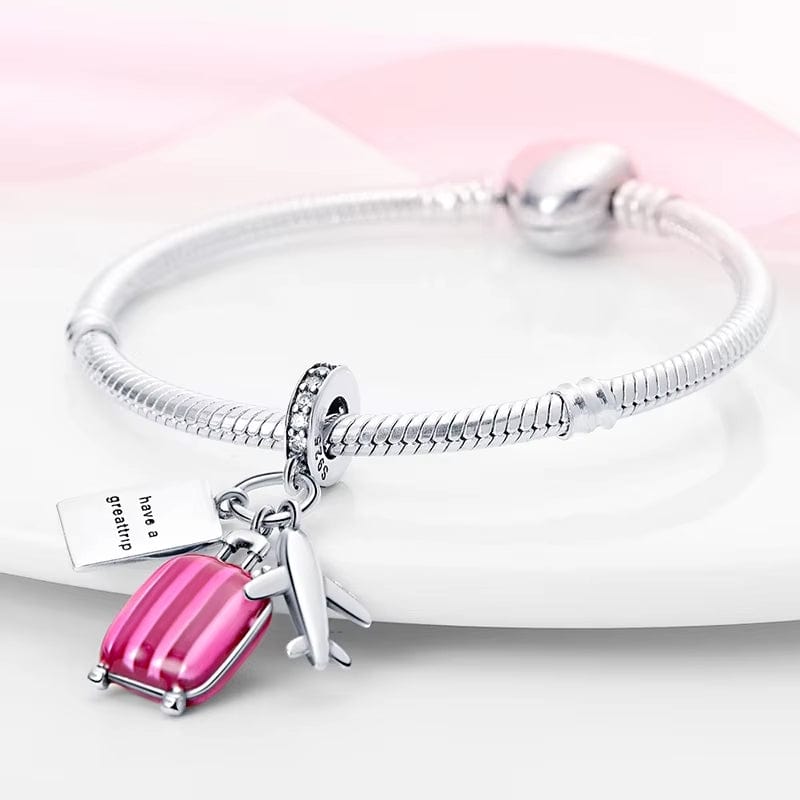 Amarante Jewelry Plane, Passport and Pink Suitcase Triple Dangle Charm