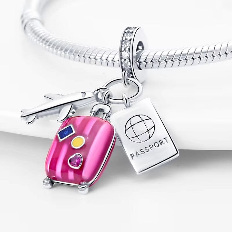 Amarante Jewelry Plane, Passport and Pink Suitcase Triple Dangle Charm