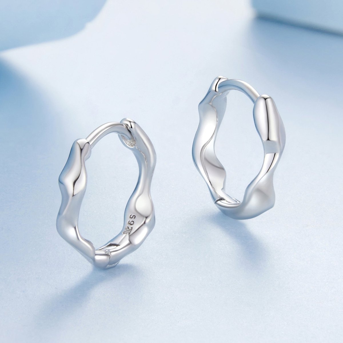Amarante Jewelry Sculpted Silver Wave Hoop Earrings