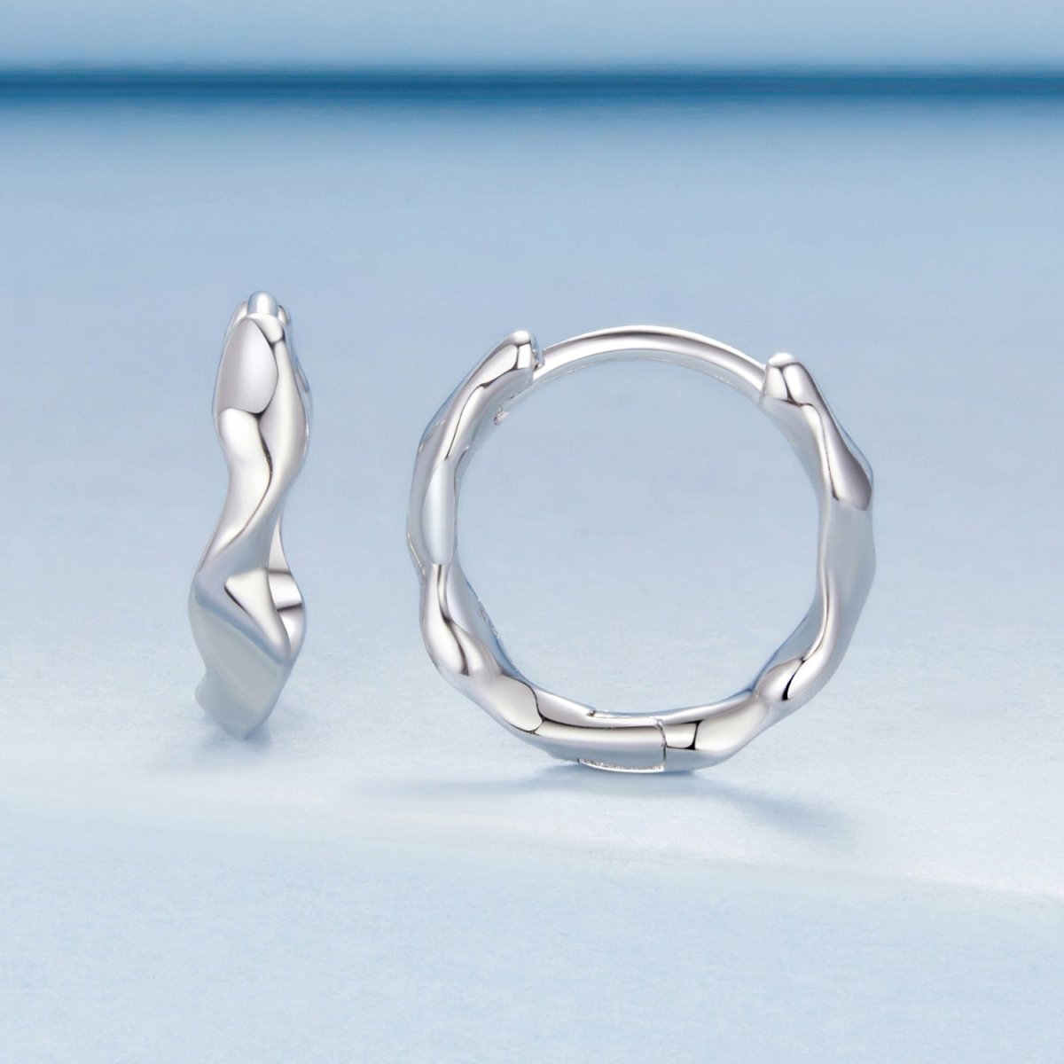 Amarante Jewelry Sculpted Silver Wave Hoop Earrings